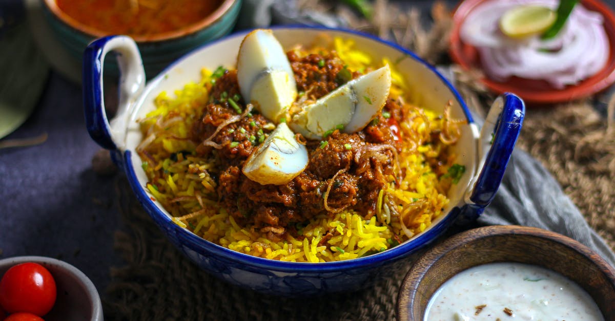 10-kilo biryani rice in check-in baggage - Egg Slices on Biryani