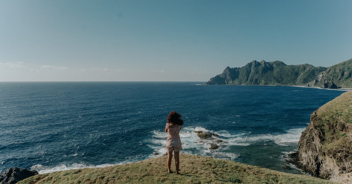 11 years Overstayed in the Philippines - Back View Photo of Woman in White Top and Shorts Standing on Cliff Near Body of Water 11 years Overstayed in the Philippines - Back View Photo of Woman in White Top and Shorts Standing on Cliff Near Body of Water