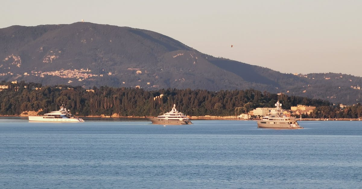 144hr Chinese Exemption - Cruising Tianjin to Shanghai? - White Boat on Sea Near Mountain 144hr Chinese Exemption - Cruising Tianjin to Shanghai? - White Boat on Sea Near Mountain