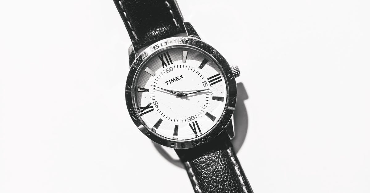 1 Hour 10 Minute Connection in New Istanbul Airport - Wristwatch with strap on white surface 1 Hour 10 Minute Connection in New Istanbul Airport - Wristwatch with strap on white surface