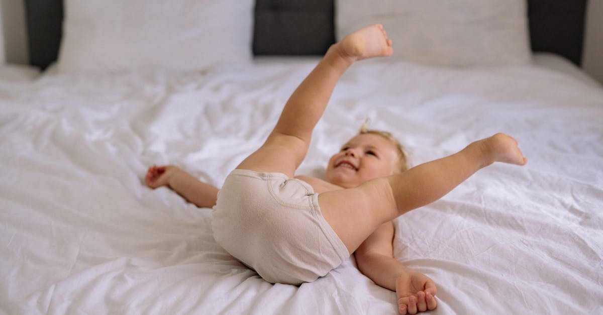 1h 10 m transfer time at MUC with Lufthansa? - Baby in White Tank Top Lying on White Bed 1h 10 m transfer time at MUC with Lufthansa? - Baby in White Tank Top Lying on White Bed
