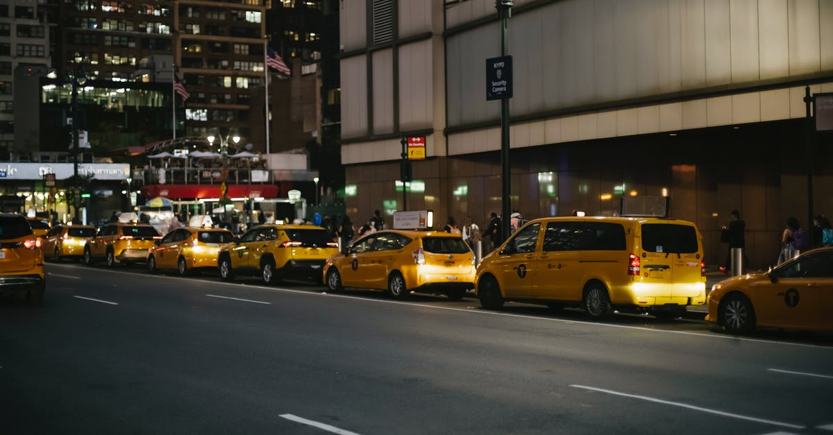 2-hour parking in the US - Contemporary various yellow cabs parked on street at night 2-hour parking in the US - Contemporary various yellow cabs parked on street at night