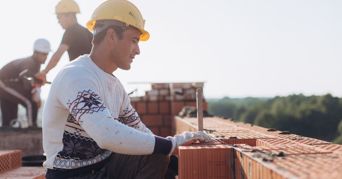 35 working days since UK visit visa was applied for. 2 'escalations', absolutely no contact [closed] - Brick Workers at Construction Site 