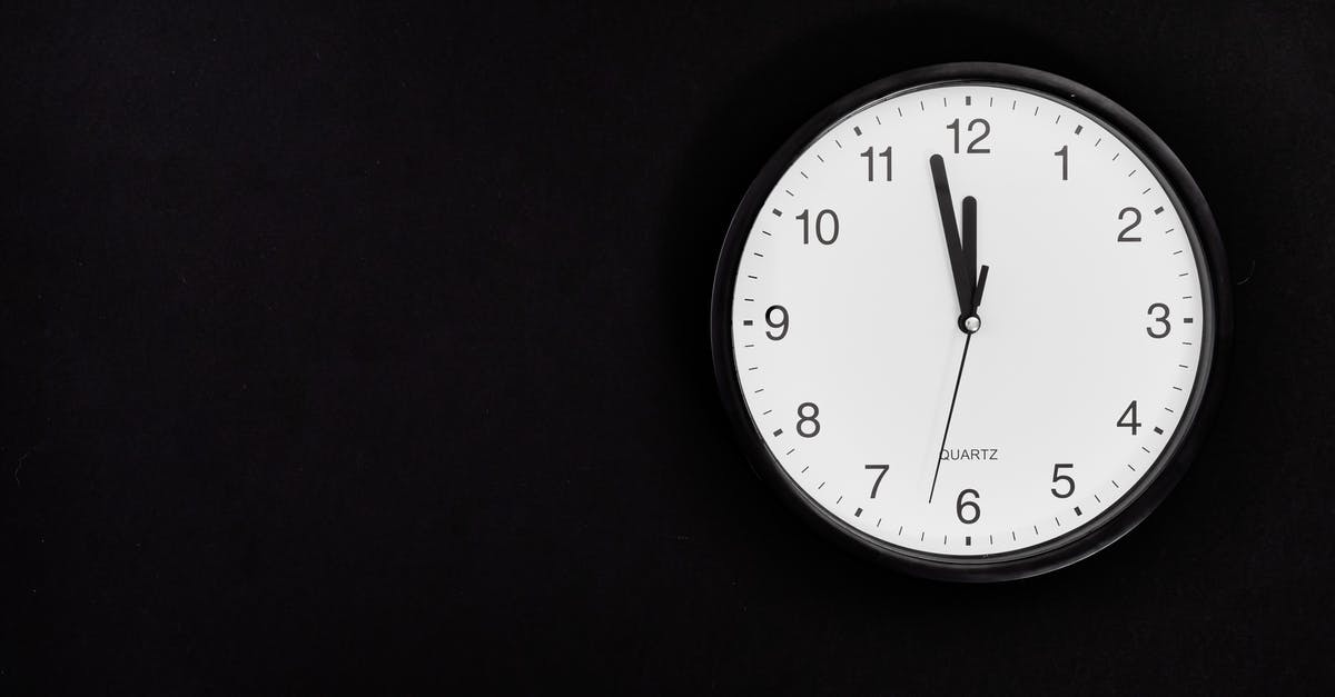 47 minute layover at Newark, is this doable? - Black Round Analog Wall Clock On Black Background 47 minute layover at Newark, is this doable? - Black Round Analog Wall Clock On Black Background