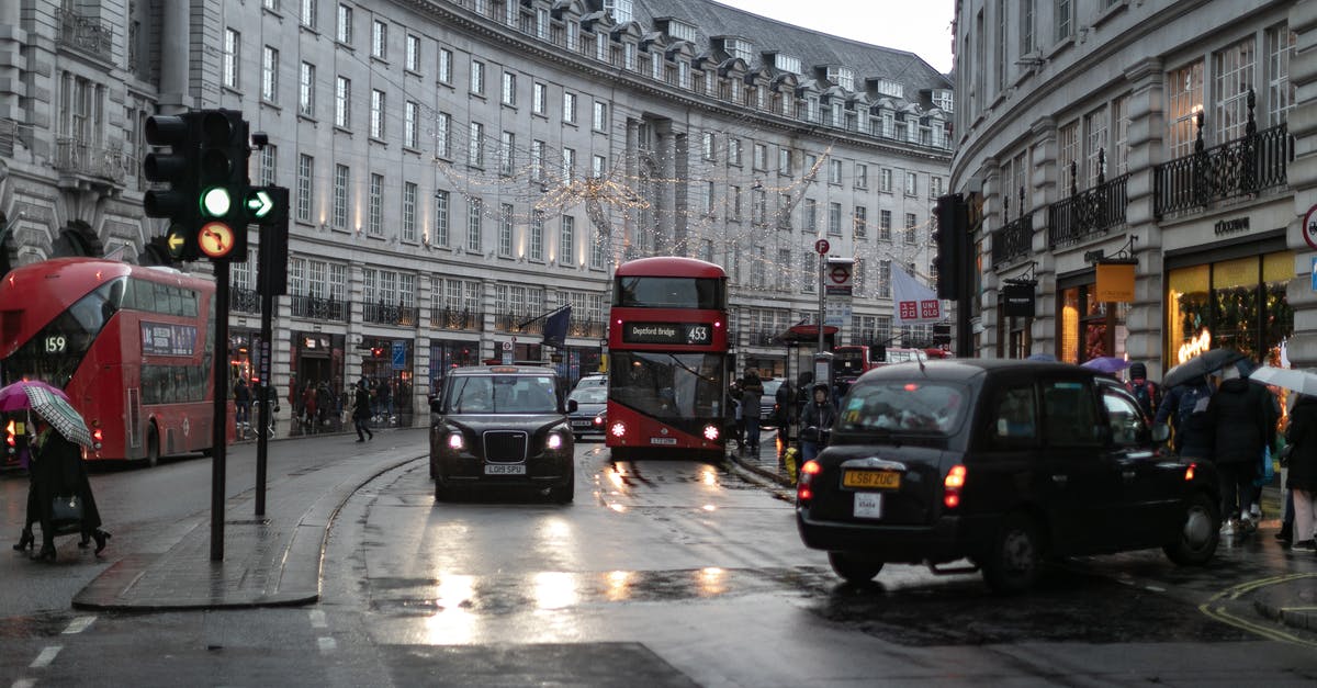 4 people in a cab in London? Is that allowed? - Photo of Picadilly Circus After Rain 4 people in a cab in London? Is that allowed? - Photo of Picadilly Circus After Rain