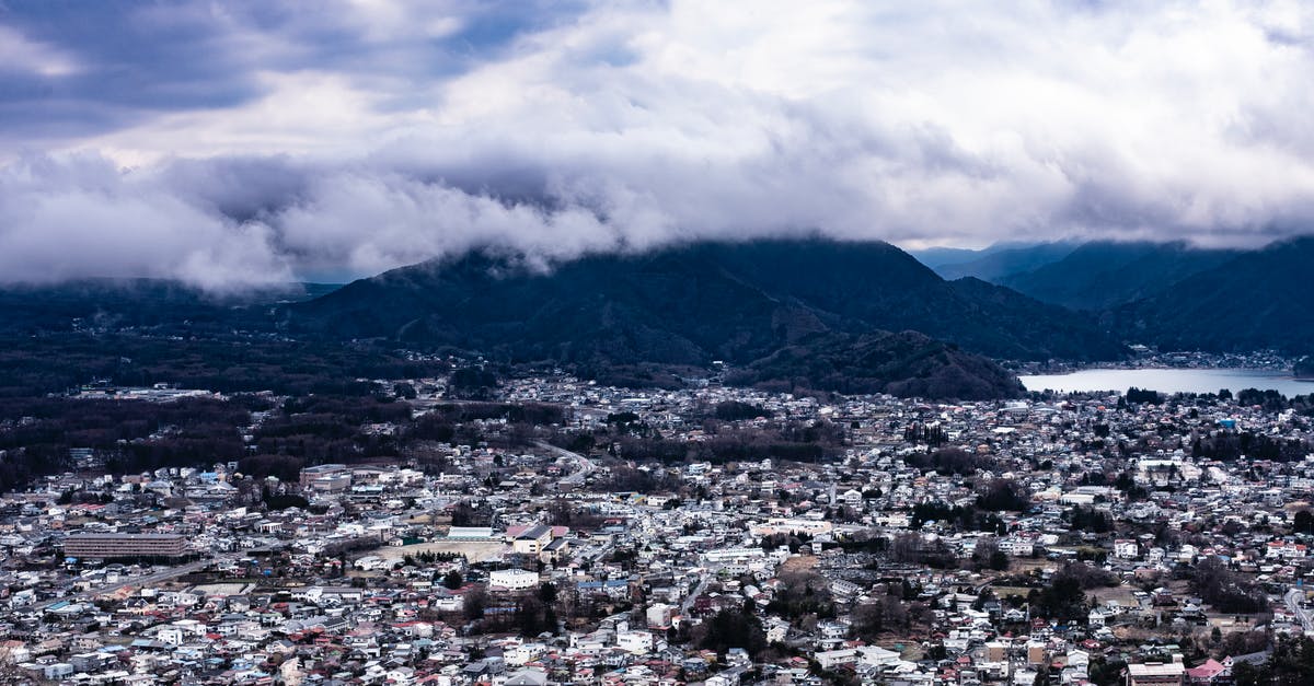 5 hour international layover in Tokyo Narita? [duplicate] - City Near Mountain Under Cloudy Sky