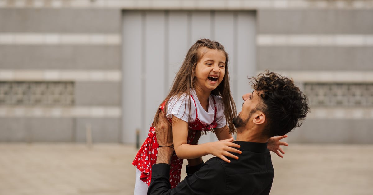 90-180 days rule: Confused about carry over days and new start of 180 day period [duplicate] - Man carrying smiling little girl in arms and laughing on city street in summer day