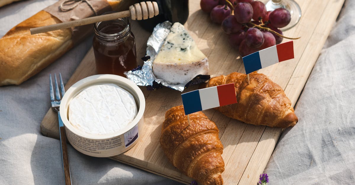 90/180-day rule: can I live in France essentially 6 months per year? [closed] - Close Up Photo of Food on Wooden Board