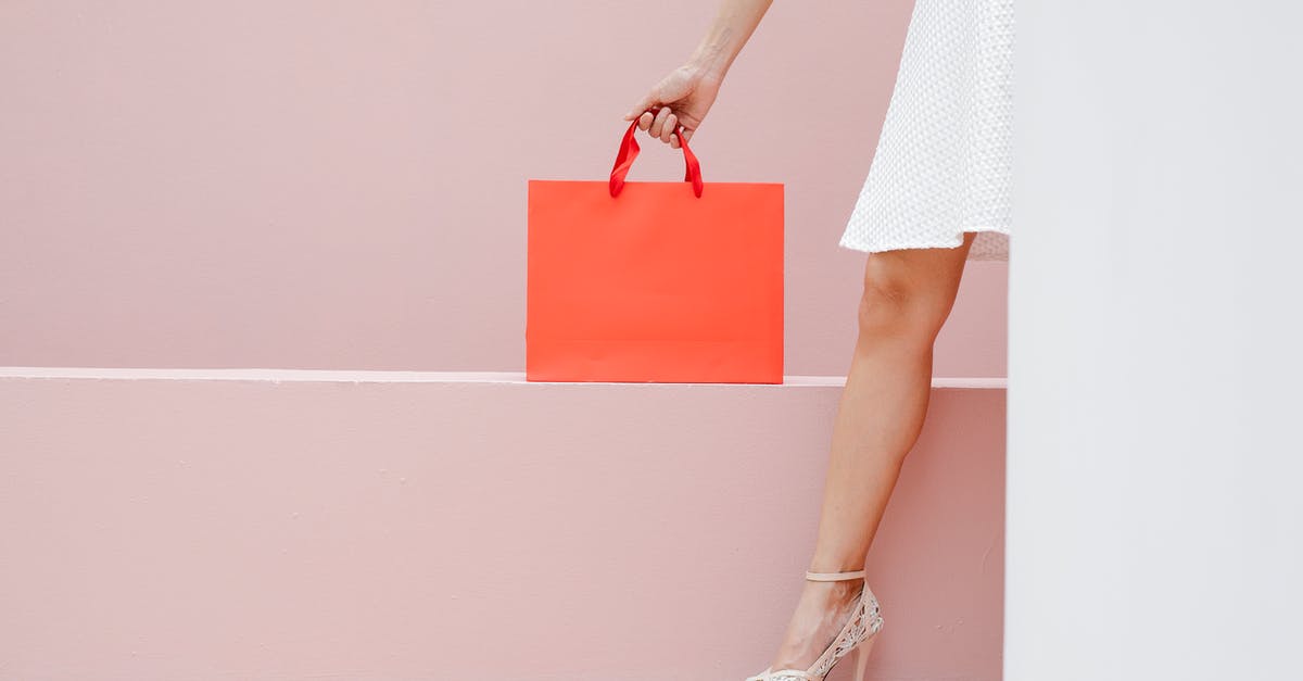 About Customs clearance in Vladivostok by DBSferry from Japan - Crop anonymous stylish female in white dress and high heels carrying red shopping bag against pink wall About Customs clearance in Vladivostok by DBSferry from Japan - Crop anonymous stylish female in white dress and high heels carrying red shopping bag against pink wall
