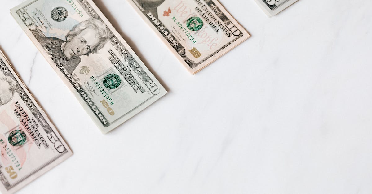 About Different Types of Visas For "Business" vs "Work" In the U.S.? - Set of various dollar banknotes on white table About Different Types of Visas For "Business" vs "Work" In the U.S.? - Set of various dollar banknotes on white table