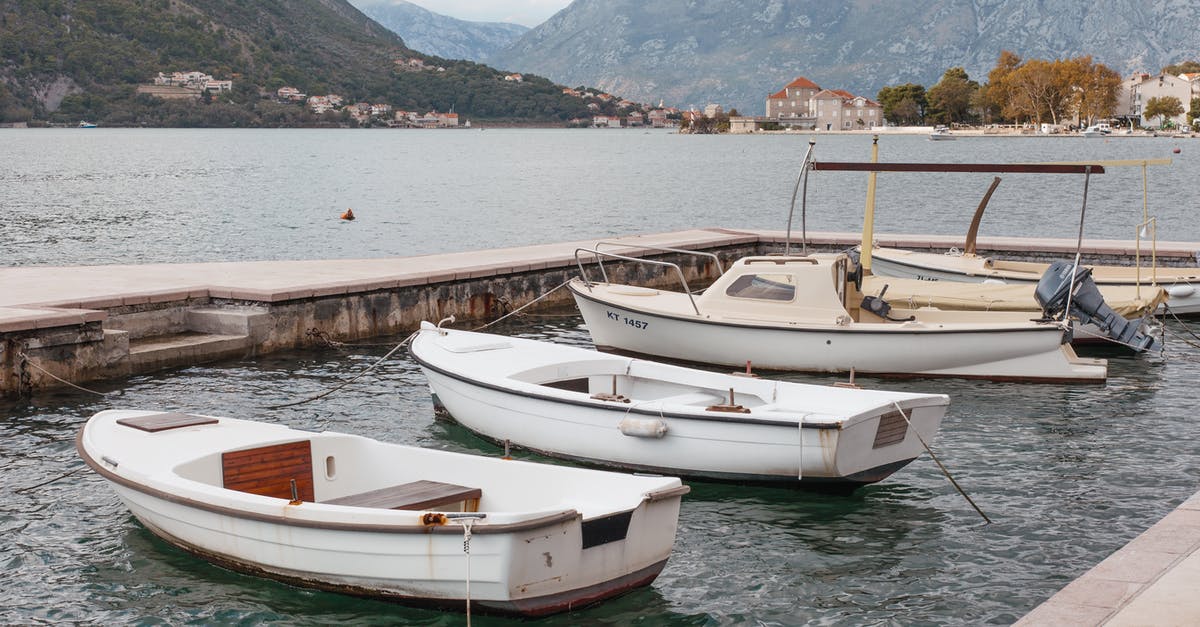 About port of entry - Schengen Visa - White and Blue Boat on Water About port of entry - Schengen Visa - White and Blue Boat on Water