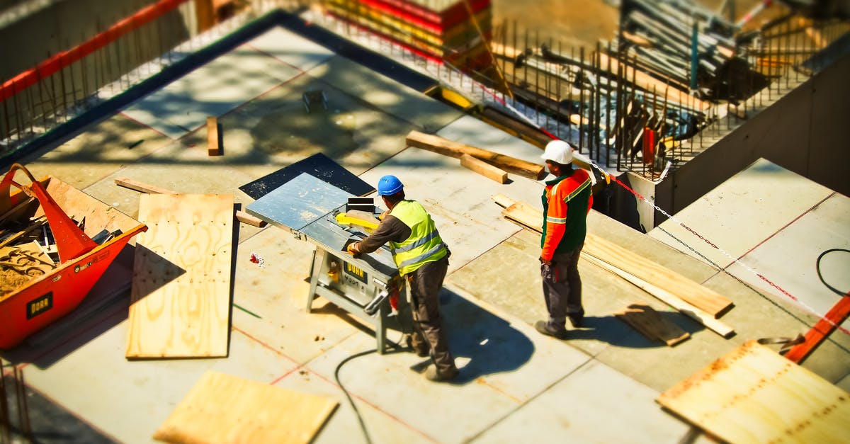 Accidentally created 2 UK visa applications on Gov.UK site - 2 Man on Construction Site during Daytime