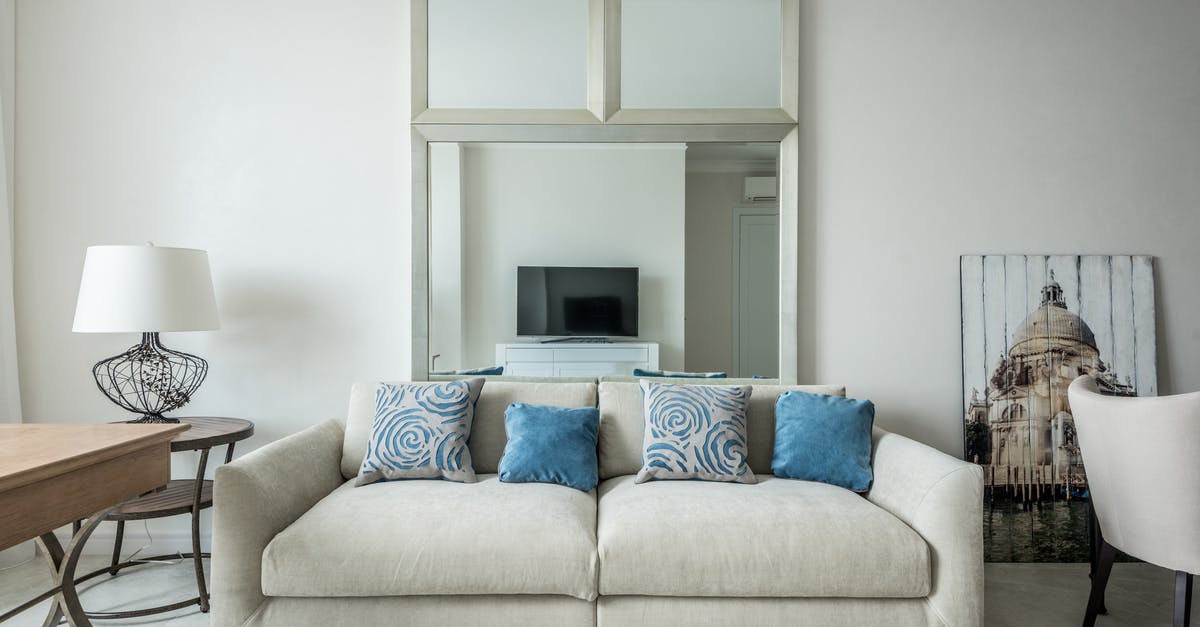 Accommodation arrangements when you only have one key - Sofa with cushions in living room Accommodation arrangements when you only have one key - Sofa with cushions in living room