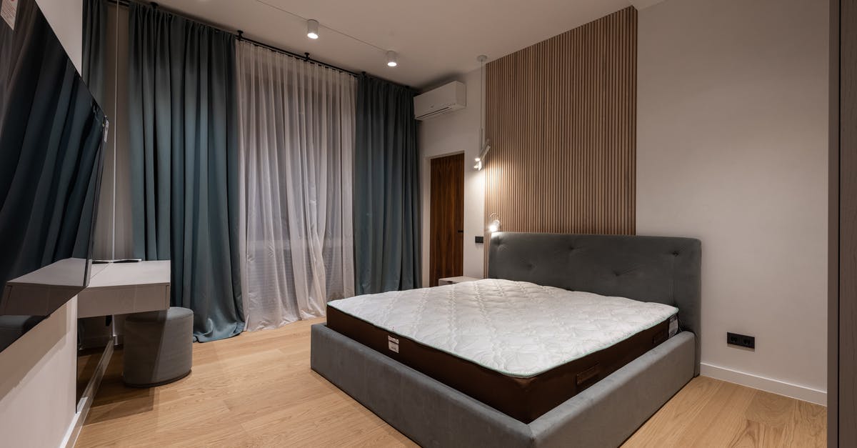 Accommodation in Rancagua, Chile for less than 30 USD/night? - Modern TV set and comfy bed in stylish room decorated with lamps and curtains Accommodation in Rancagua, Chile for less than 30 USD/night? - Modern TV set and comfy bed in stylish room decorated with lamps and curtains