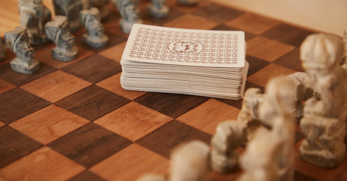 Activate Verizon SIM Card While In Canada - Chessboard with chess pieces and game of cards Activate Verizon SIM Card While In Canada - Chessboard with chess pieces and game of cards
