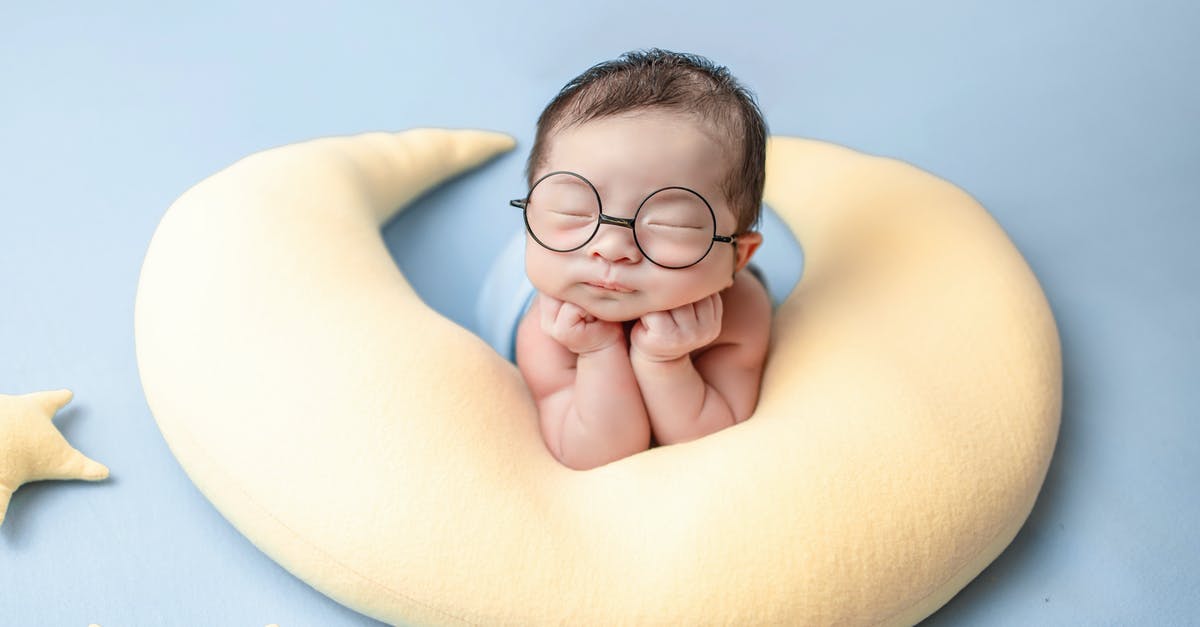 Adding a newborn child to US tourist visa (B1/B2) - Topless Boy Wearing Black Framed Eyeglasses Lying on Yellow Banana Bed Adding a newborn child to US tourist visa (B1/B2) - Topless Boy Wearing Black Framed Eyeglasses Lying on Yellow Banana Bed