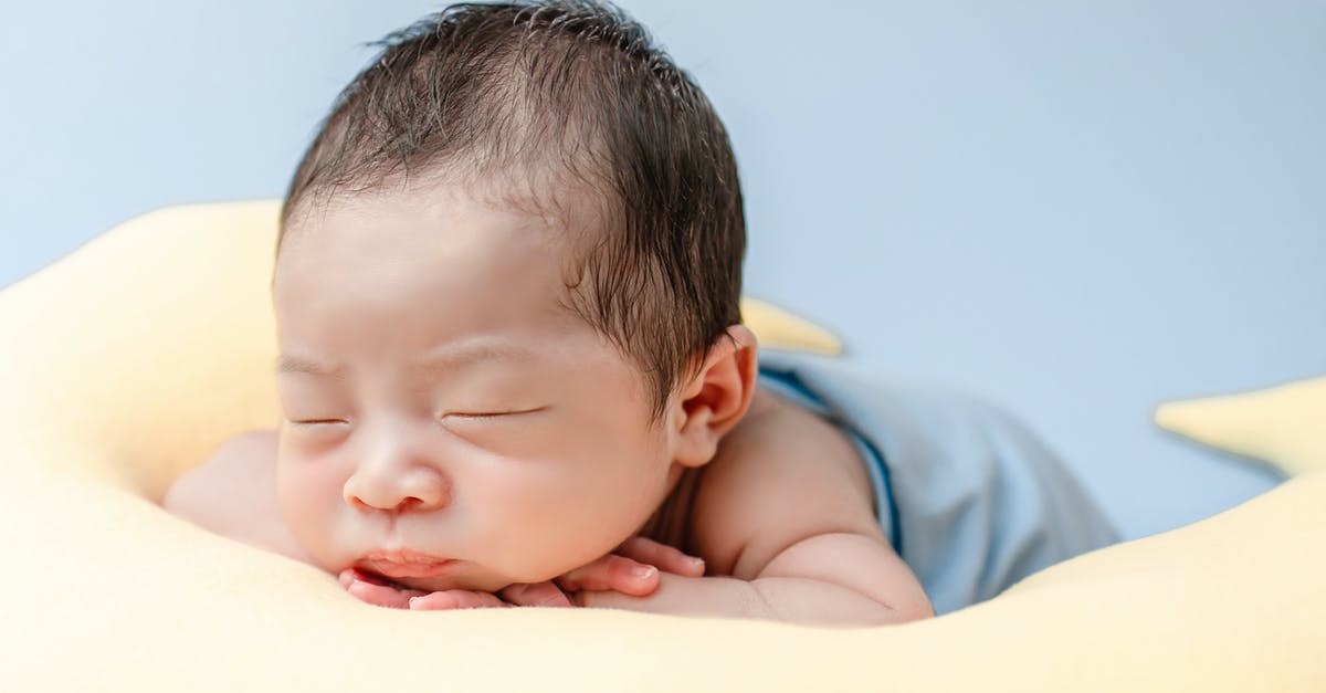 Adding a newborn child to US tourist visa (B1/B2) - Close-up Photo of a Cute Newborn Adding a newborn child to US tourist visa (B1/B2) - Close-up Photo of a Cute Newborn