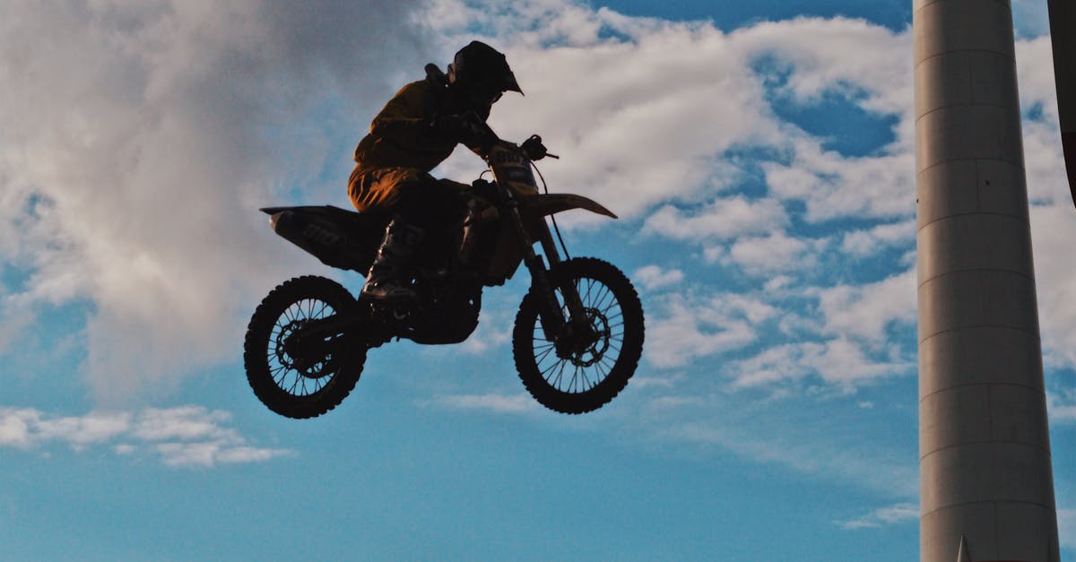 Additional weight when taking a bike with Air Brunei - Man Riding Motocross Dirt Bike