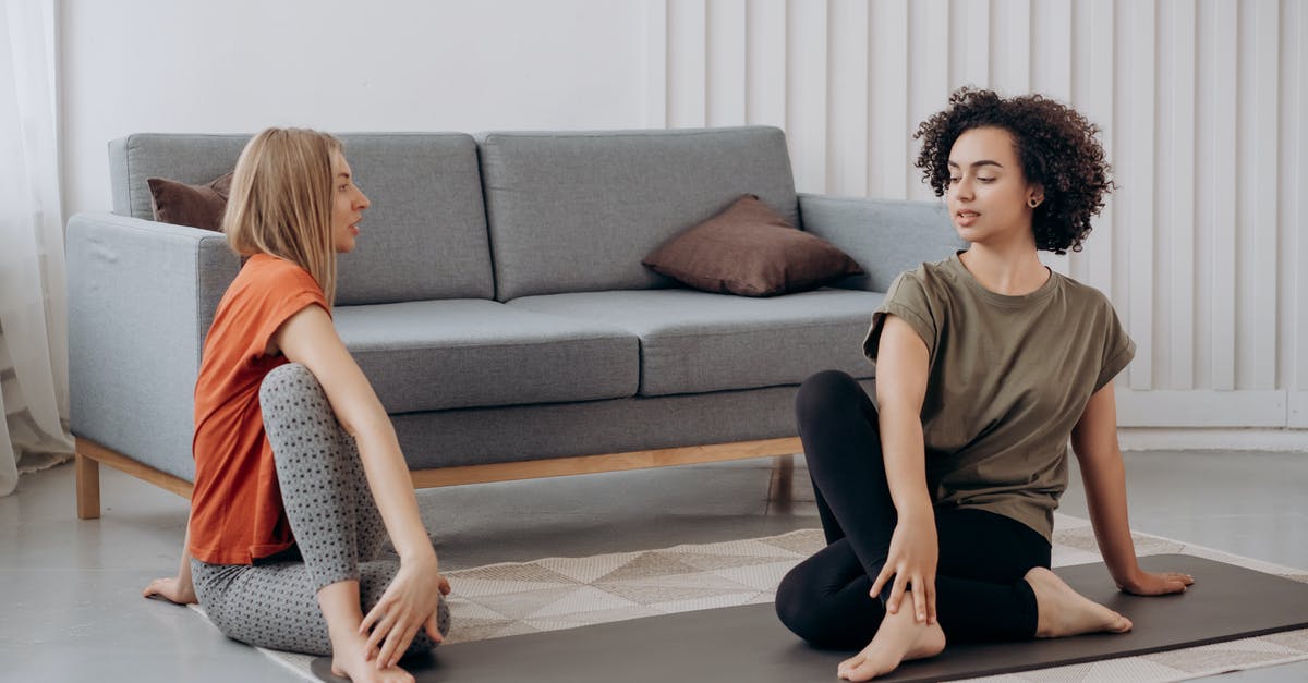 Advantage of visiting two Nazi concentration camps? [closed] - Two Women Doing Yoga