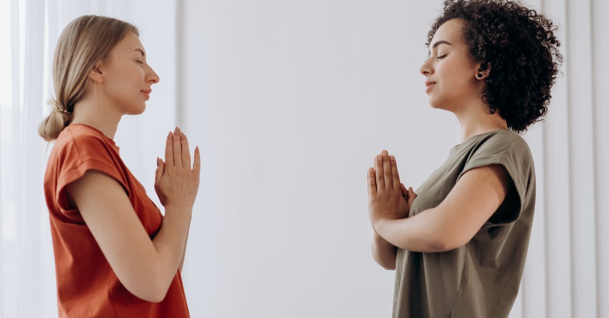 Advantage of visiting two Nazi concentration camps? [closed] - Two Women Doing Yoga