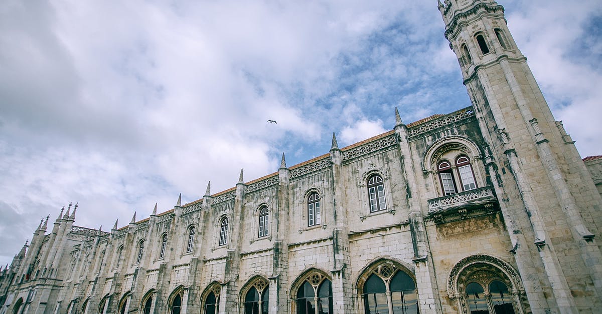 Air Canada luggage allowance when flying from Europe to USA - Facade of Jeronimos Monastery near lawn under cloudy sky Air Canada luggage allowance when flying from Europe to USA - Facade of Jeronimos Monastery near lawn under cloudy sky