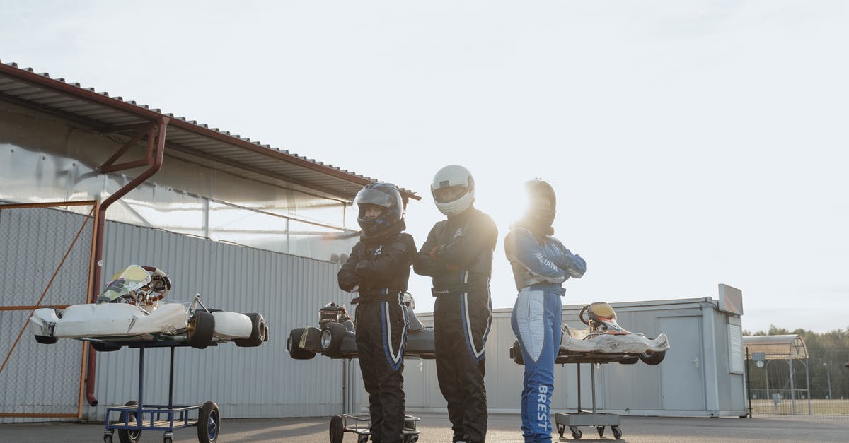 Air travel with a competition sword? - 3 Men in Gray and Black Camouflage Uniform Standing on Gray Pavement Air travel with a competition sword? - 3 Men in Gray and Black Camouflage Uniform Standing on Gray Pavement