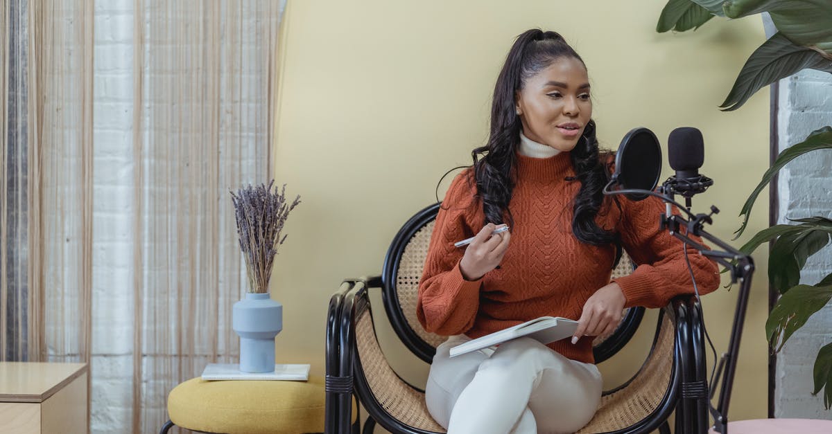 Airbnb - host wants to reduce rooms, can we get refund? - Cheerful black woman recording audio podcast Airbnb - host wants to reduce rooms, can we get refund? - Cheerful black woman recording audio podcast