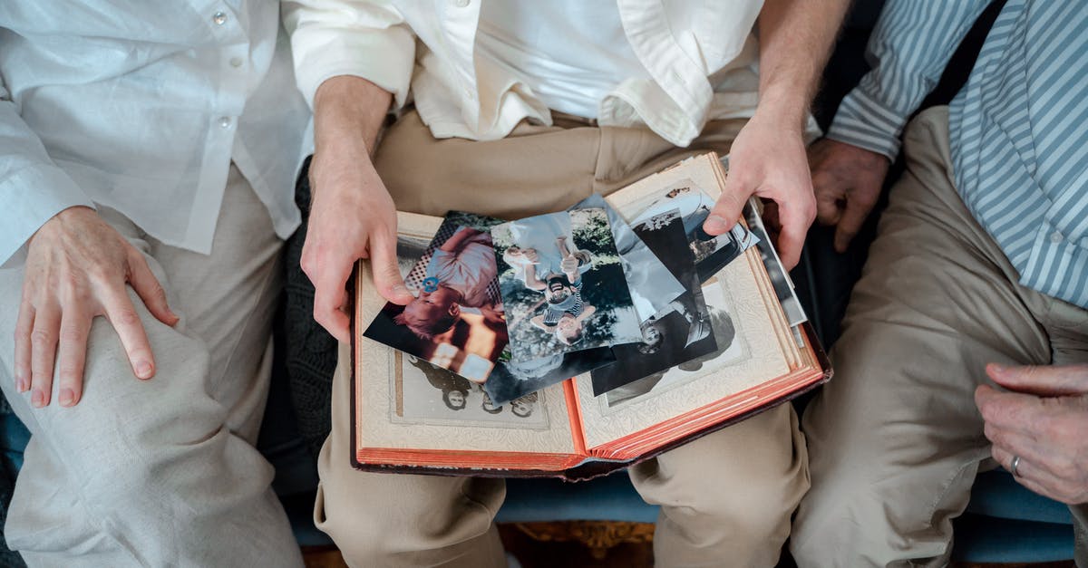 Airbnb hosts wants me to send pictures of all guests' IDs - Person in White Button Up Shirt and Gray Pants Holding Black and Red Floral Print Book Airbnb hosts wants me to send pictures of all guests' IDs - Person in White Button Up Shirt and Gray Pants Holding Black and Red Floral Print Book
