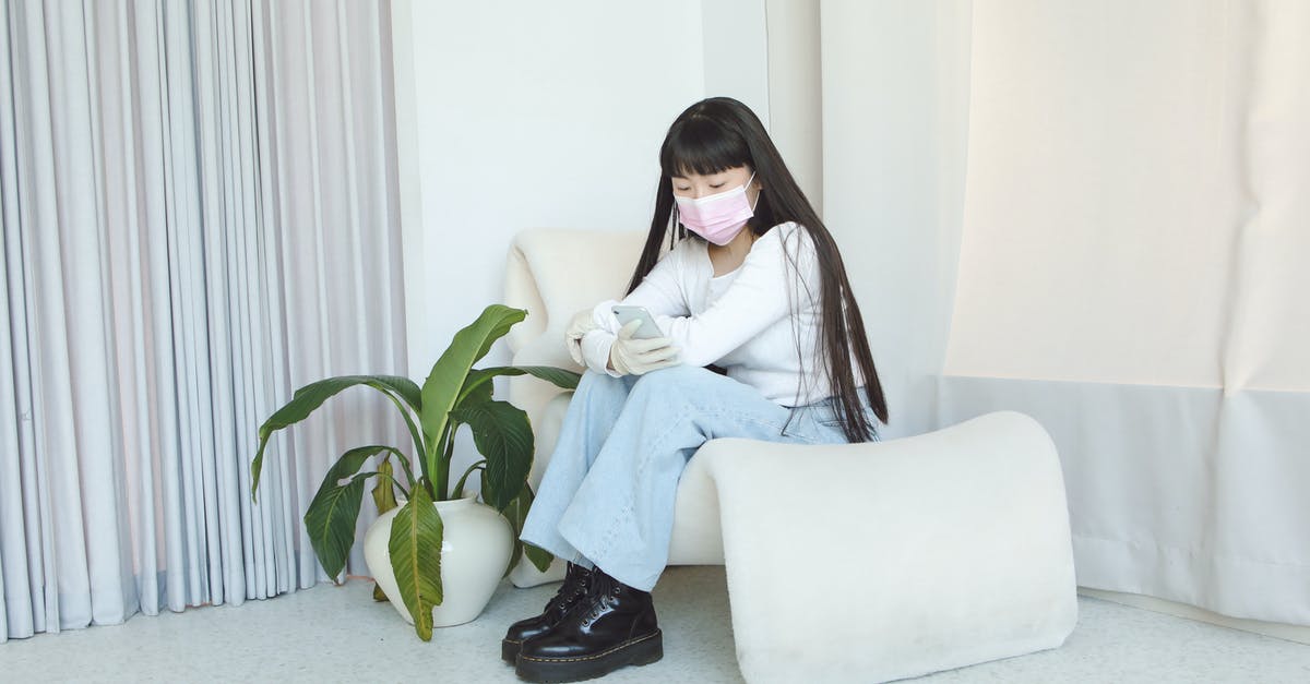 Airfare refunds for coronavirus - A Woman in White Sweatshirt and Denim Jeans Sitting on the Chair while Using Her Mobile Phone Airfare refunds for coronavirus - A Woman in White Sweatshirt and Denim Jeans Sitting on the Chair while Using Her Mobile Phone