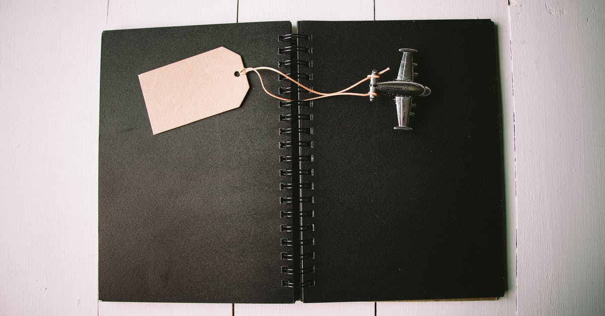Airplane ticket booked under my middle name - Brown Bookmark and Black Plane Keychain Airplane ticket booked under my middle name - Brown Bookmark and Black Plane Keychain