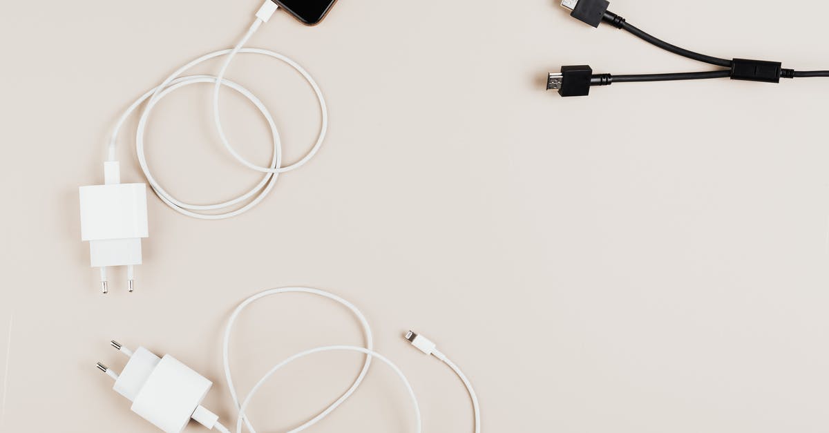 Airside connections at EWR? - White Usb Cable on White Table Airside connections at EWR? - White Usb Cable on White Table