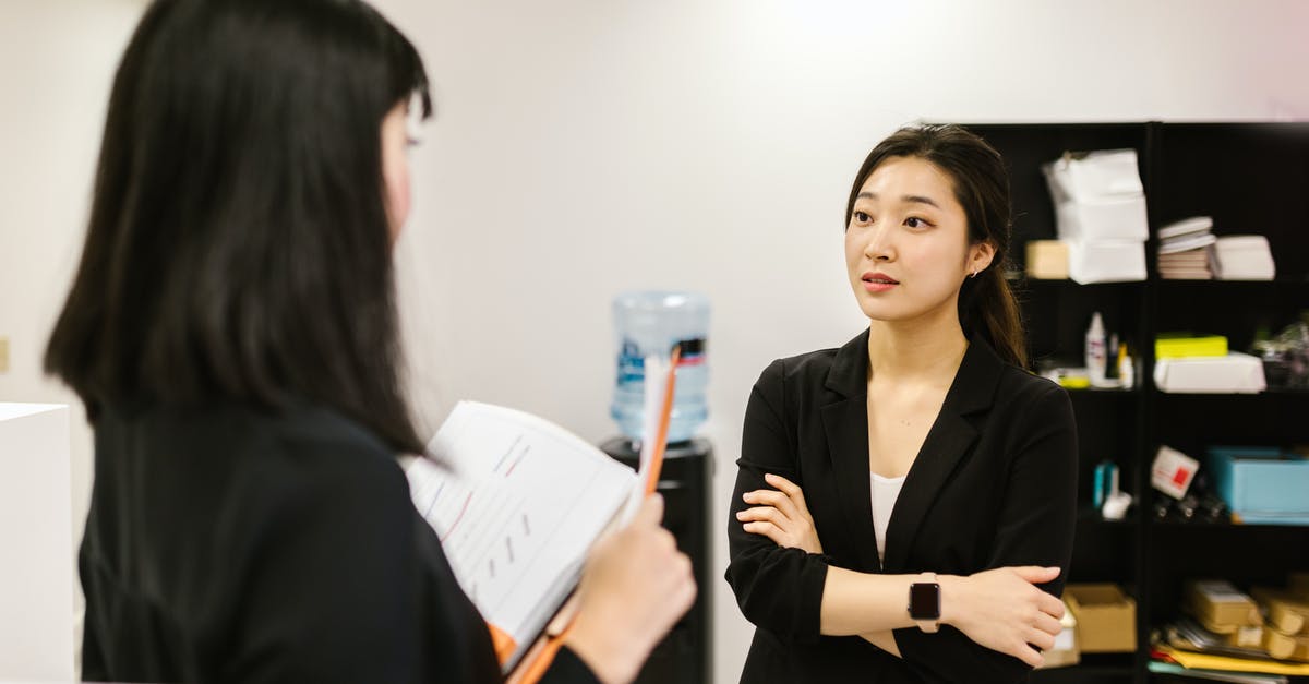 Am I over-staying in the Philippines? Japanese Dual citizen - A Woman Listening to a Coworker at an Office Am I over-staying in the Philippines? Japanese Dual citizen - A Woman Listening to a Coworker at an Office