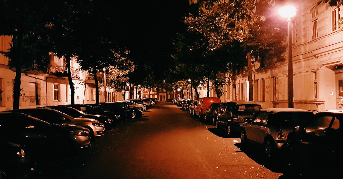 Amsterdam to Berlin - Hire Car - Assorted Cars Parking on Street during Nighttime Amsterdam to Berlin - Hire Car - Assorted Cars Parking on Street during Nighttime