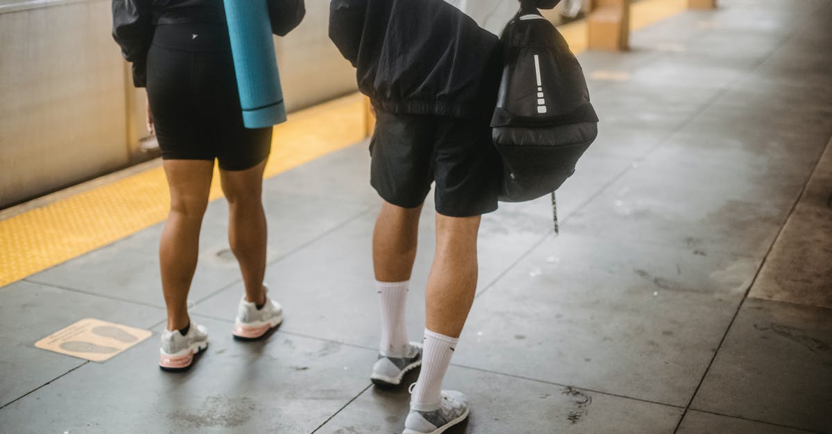 Amtrak: checking bags before the station opens - Person in Black Shorts and White Socks Amtrak: checking bags before the station opens - Person in Black Shorts and White Socks