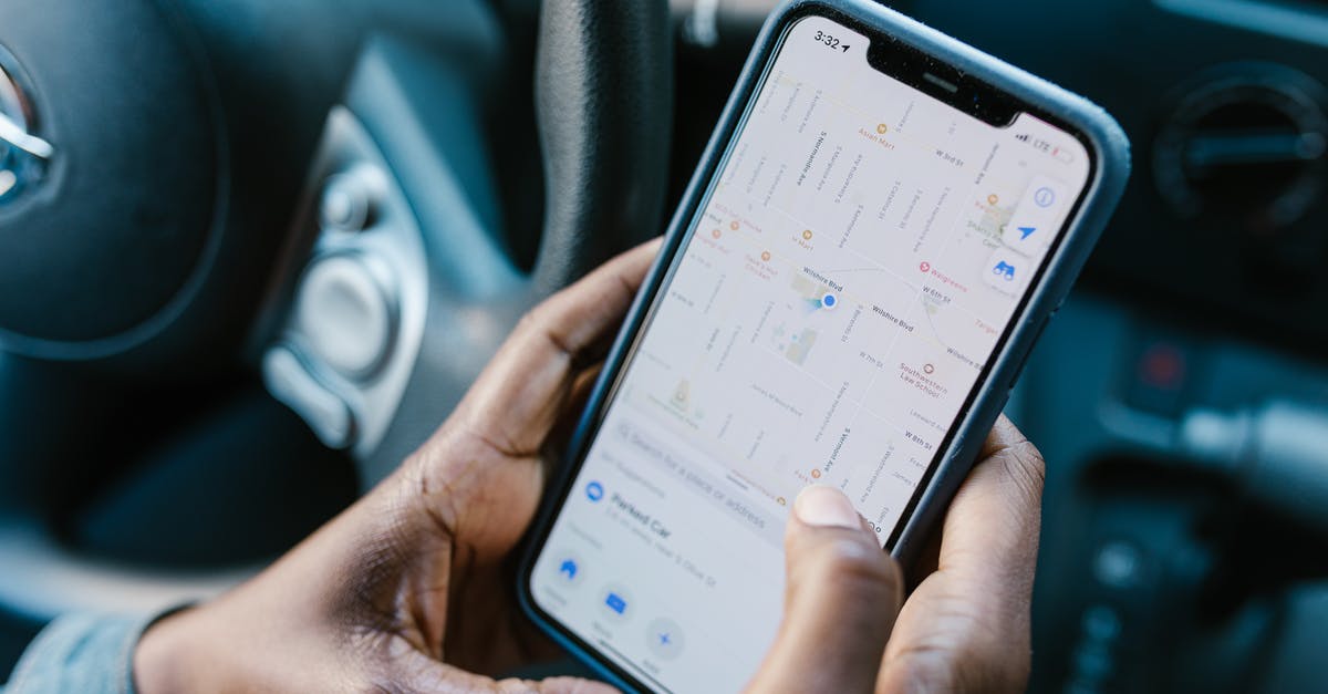 Android app for offline GPS maps - A Person Checking the GPS on the Cellphone Android app for offline GPS maps - A Person Checking the GPS on the Cellphone
