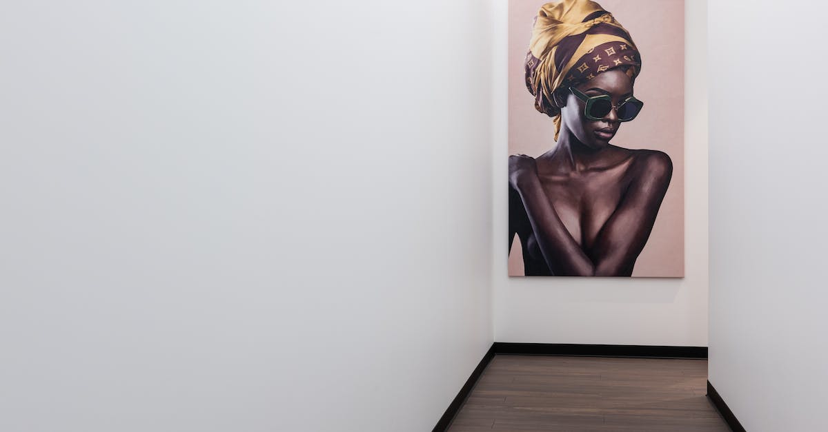 Any beaches along the New York - Boston corridor? [closed] - Interior if empty hallway with colorful poster on white wall and parquet floor