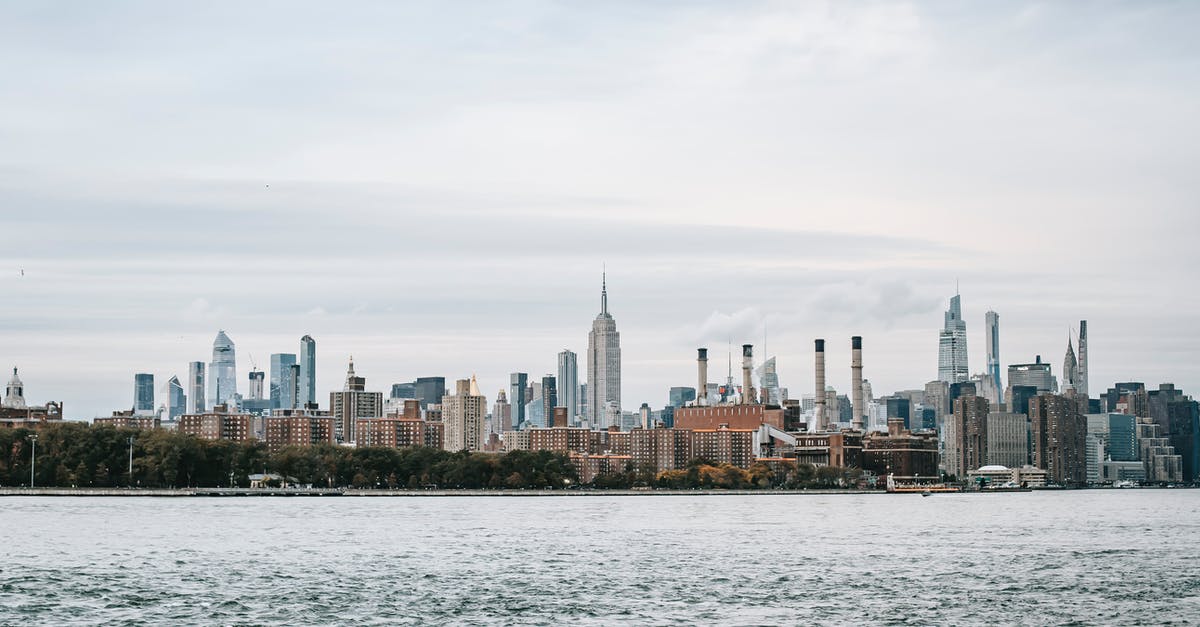 Any benefit to sticking with a particular hotel chain on US East Coast? - Scenery of New York cityscape with modern urban architecture situated on rippling East River coast on clear weather Any benefit to sticking with a particular hotel chain on US East Coast? - Scenery of New York cityscape with modern urban architecture situated on rippling East River coast on clear weather