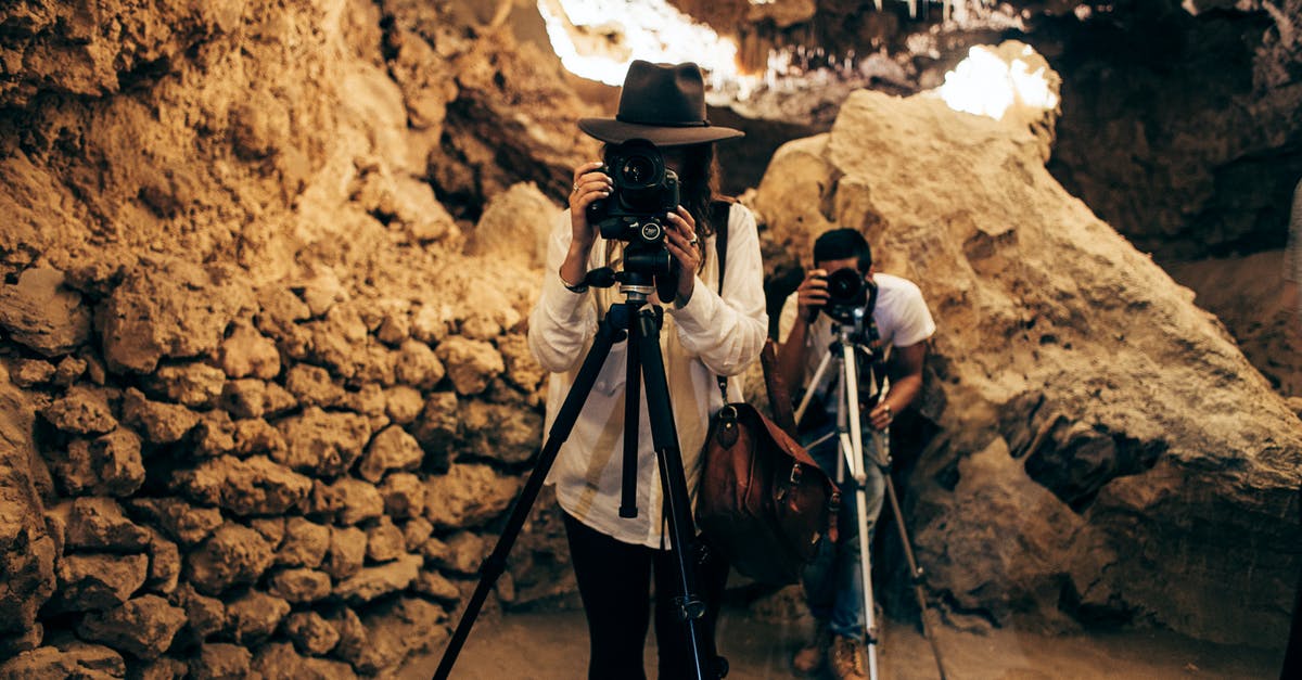 Any law forbids taking pieces of rocks out of Scotland? - Man in Black Hat and Black Jacket Holding Black and Gray Dslr Camera Any law forbids taking pieces of rocks out of Scotland? - Man in Black Hat and Black Jacket Holding Black and Gray Dslr Camera