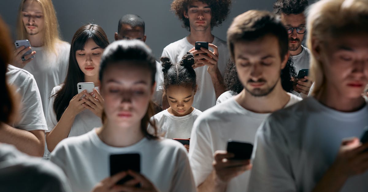Any way of knowing if hostel will be busy in advance? [closed] - Photo of People Engaged on their Phones