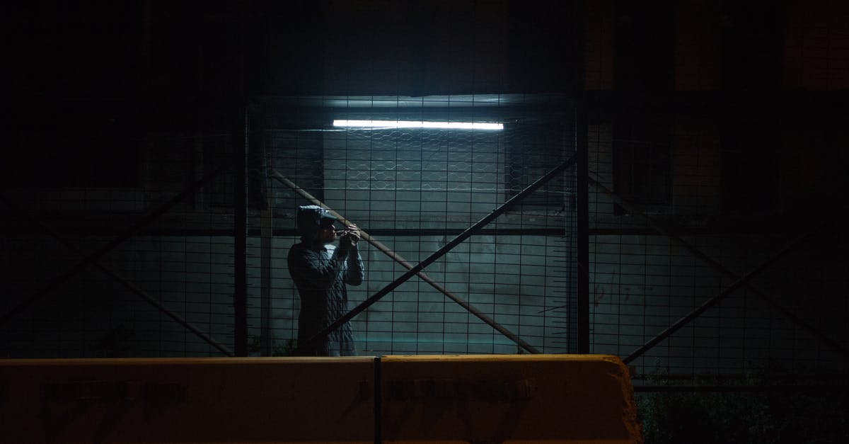 Anyone know of any late night co-working spaces in London? [closed] - Unrecognizable man standing near parking lot