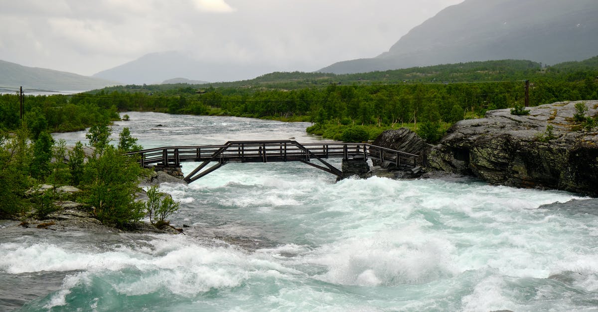 Appeal for refused visa to Norway - Brown Wooden Dock on River Appeal for refused visa to Norway - Brown Wooden Dock on River
