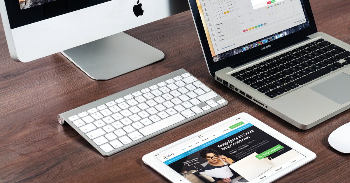 Apple iMac to India; Customs duty clarification - Turned on Imac Beside Macbook on Table Apple iMac to India; Customs duty clarification - Turned on Imac Beside Macbook on Table