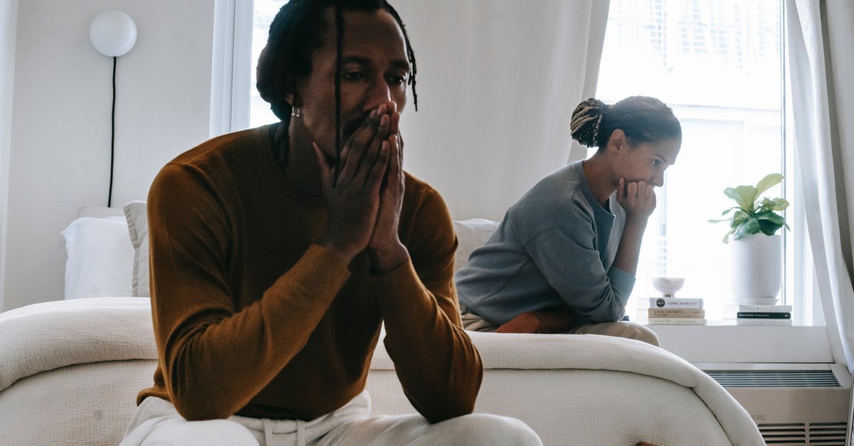 Applied for a UK visa as a couple, but only wife received a notification about getting her passport back. Should I be worried? - Wistful concerned African American couple in casual clothing sitting on bed at home after having quarrel Applied for a UK visa as a couple, but only wife received a notification about getting her passport back. Should I be worried? - Wistful concerned African American couple in casual clothing sitting on bed at home after having quarrel