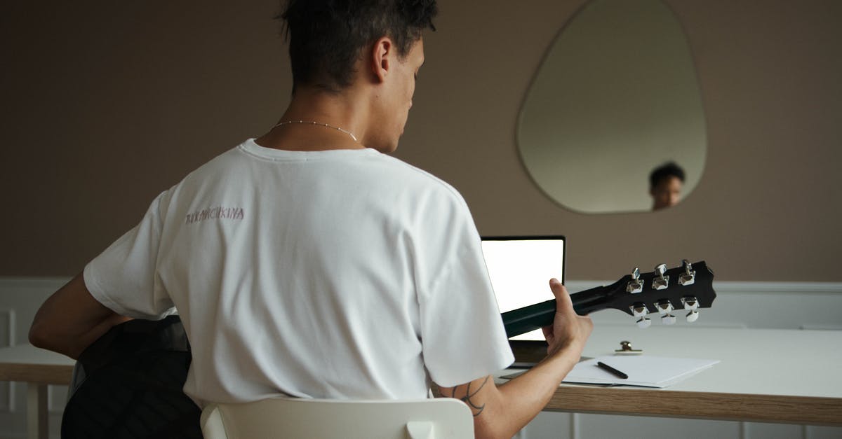 Applied for a UK visa as a family, but received status on only one applicant. Is this common? [closed] - Man in White Crew Neck T-shirt Sitting on Chair