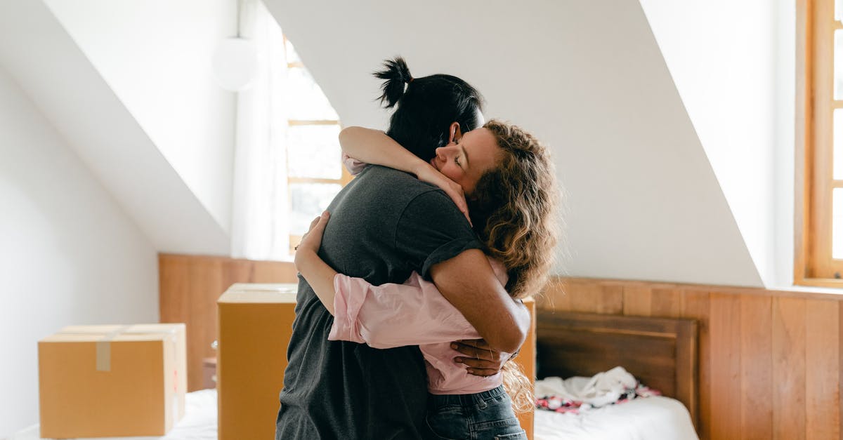 Apply for new schengen visa with validity date 1 week prior to the start of my existing visa - Happy couple hugging after moving in new apartment Apply for new schengen visa with validity date 1 week prior to the start of my existing visa - Happy couple hugging after moving in new apartment