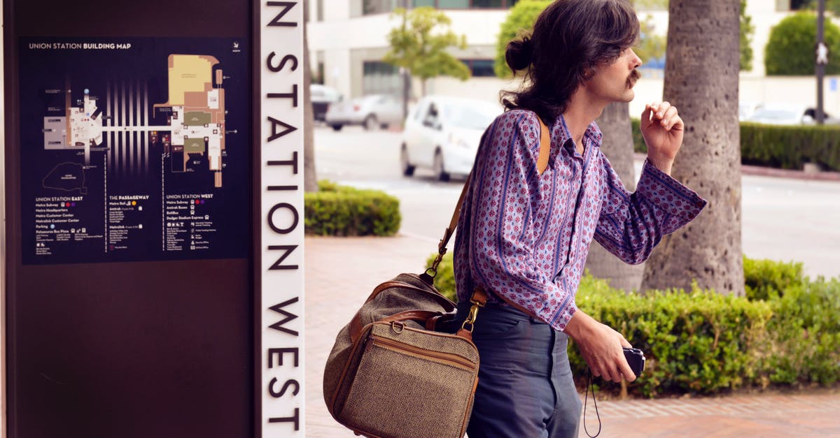 Applying as a dependent 457 visa subclass of spouse while waiting for tourist visa - Person Wearing Purple Dress Shirt and Black Pants White Carrying Brown Sling Bag Applying as a dependent 457 visa subclass of spouse while waiting for tourist visa - Person Wearing Purple Dress Shirt and Black Pants White Carrying Brown Sling Bag