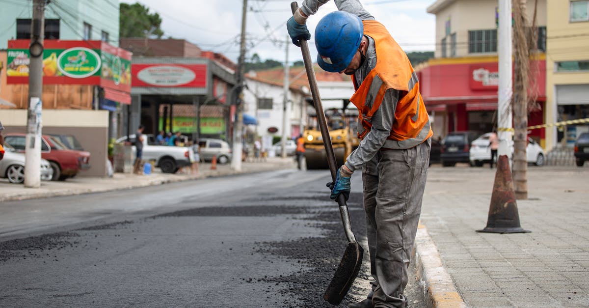 Applying for Indefinite Leave to Remain on Tier 2 visa requirement - do the 5 years of working need to be continous? [closed] - Free stock photo of accident, adult, asphalt