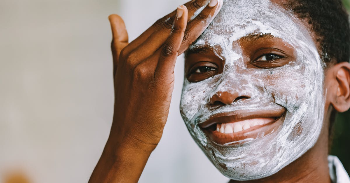 Applying for UK Visa - Person With White Face Paint Applying for UK Visa - Person With White Face Paint