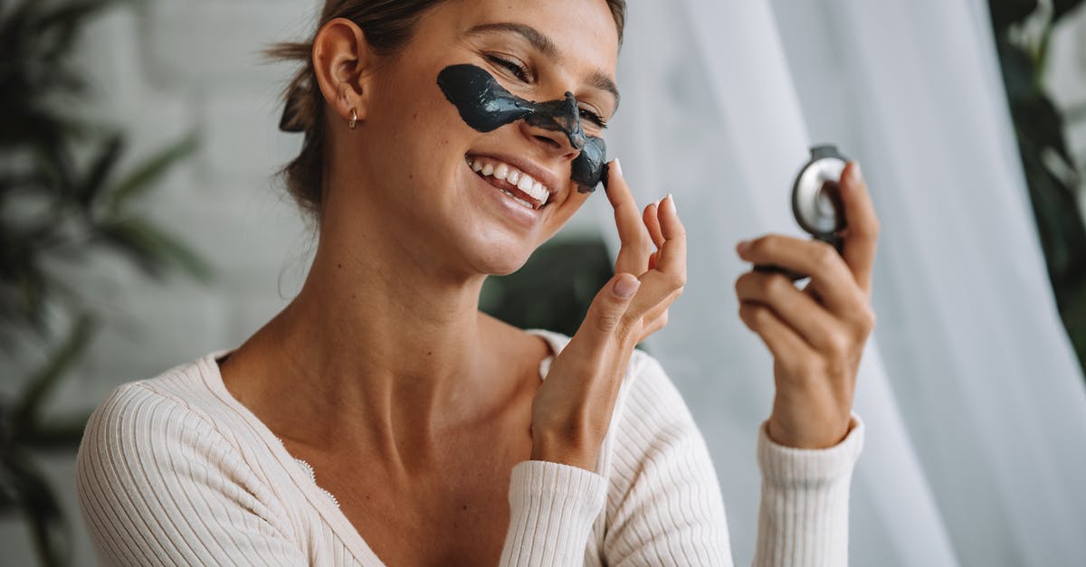 Applying for UK Visa - Woman in White Sweater Wearing Black Sunglasses Applying for UK Visa - Woman in White Sweater Wearing Black Sunglasses
