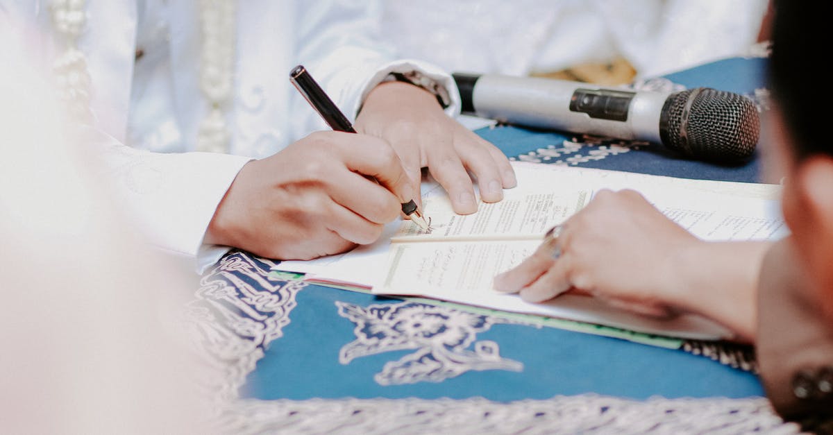 Applying for UK Visa - what documents can I submit in lieu of marriage certificate? - A Groom Signing a Marriage Contract